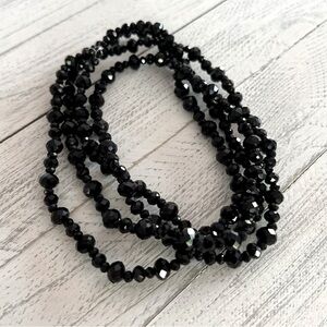 Vintage extra long black necklace faceted in crystal rondelle beads new